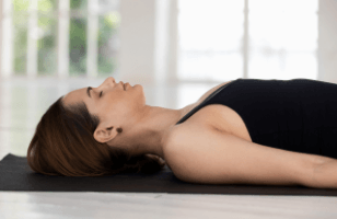 young-attractive-woman-parivrtta-janu-sirsasana-pose-white-b